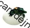 Dráček klubající se z vajíčka zelený